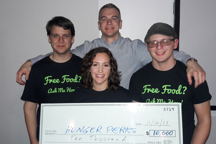 HungerPearks team with big check