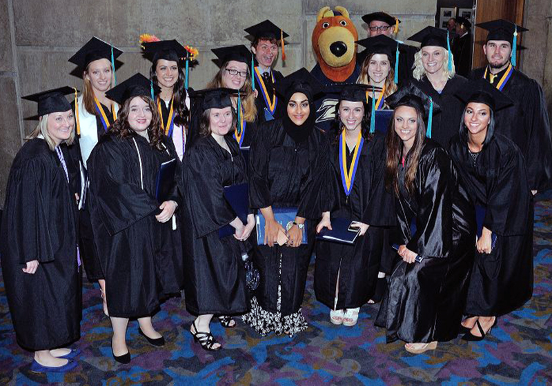 Group of UA graduates at Thomas Hall