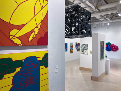 A gallery at the Myers School of Art with an exhibit of undergraduate work.