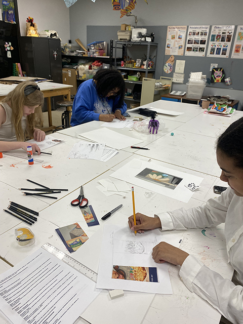 Young students working with art supplies