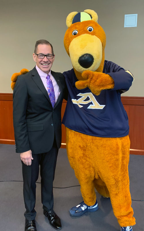 Mitchell S. McKinney, Ph.D. with Zippy