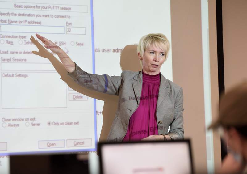A computer professor teaching a class at The University of Akron