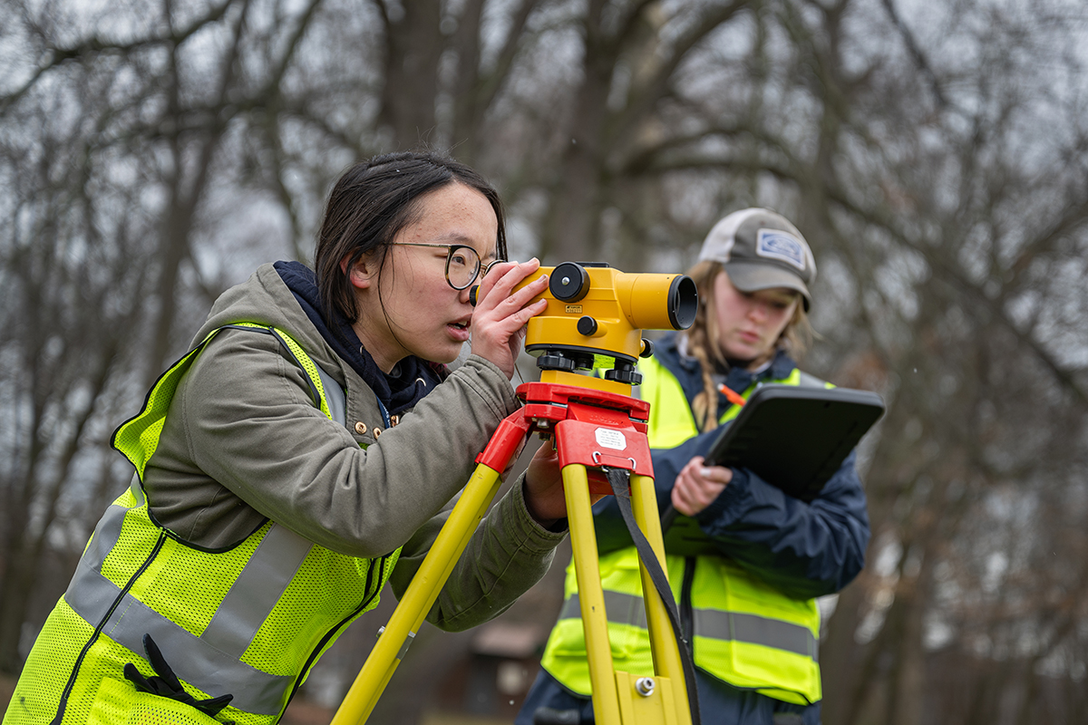 Madison Richards, UA ASCE President, and Rachel Freno, co-captain of the surveying team, competing in the surveying competition.