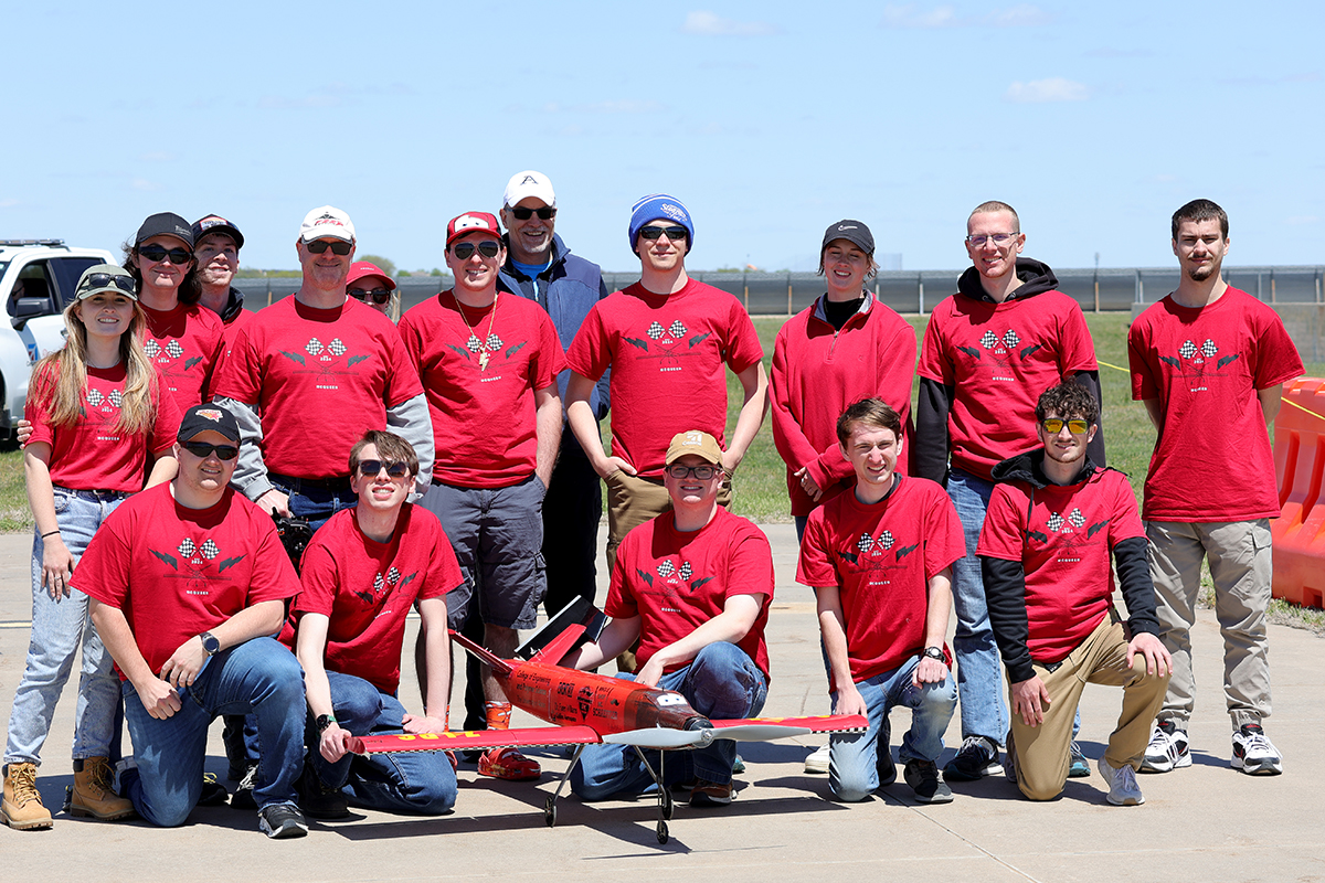 Zips Aero Design Team members at the American Institute of Aeronautics and Astronautics Design Build Fly competition held in Wichita, KS.
