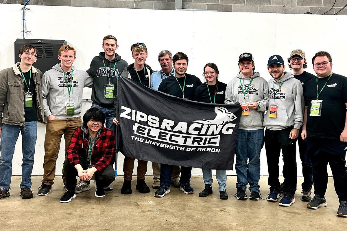 Zips Racing Electric Design Team members at the New Hampshire Hybrid + Electric Event.