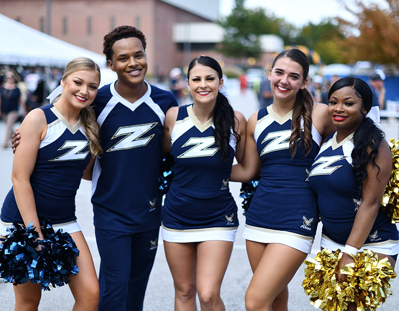 A photo of the University of Akron cheerleaders.