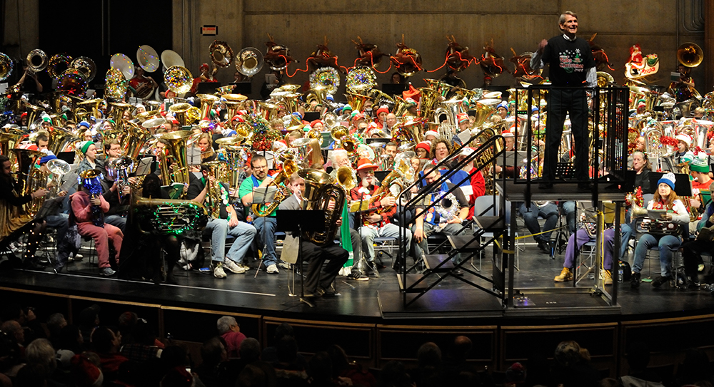 TubaChristmas performers with Tucker Jolly on platform