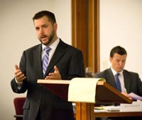 An Akron Law student in moot court, practicing his skills