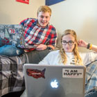 Two students study in a residence hall at Akron