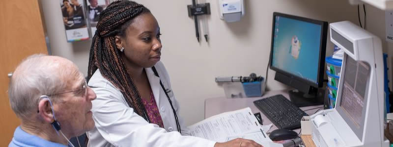 UA speech language pathology student working with a patient in our center at The University of Akron campus